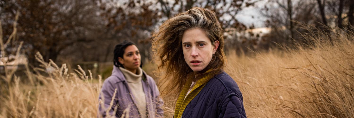 Hannah Gold and Jackie Soro in a field of tall grass, by Wide Eyed 