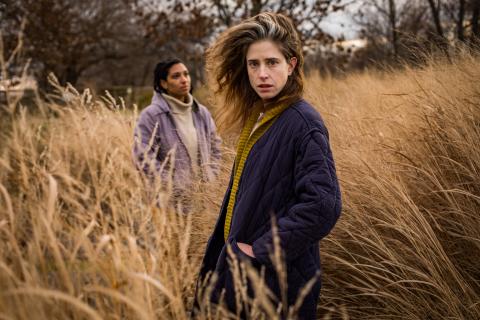 Hannah Gold and Jackie Soro in a field of tall grass, by Wide Eyed 